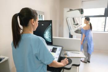 mammogram technician and patient