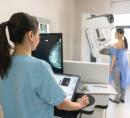 mammogram technician and patient